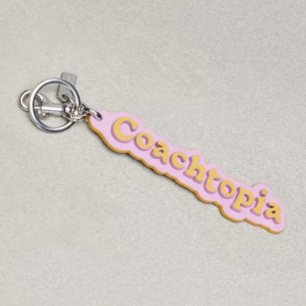 Coach Coachtopia Logo Bag Charm in Violet Orchid/Flax Coachtopia Leather NWT - Picture 9 of 16